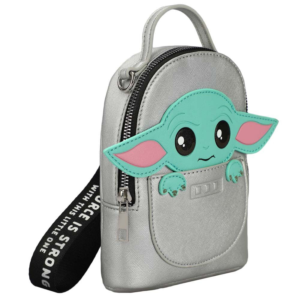 Angeled view of a mini travel bags silver with a Grogu vinyl applique, with black handle